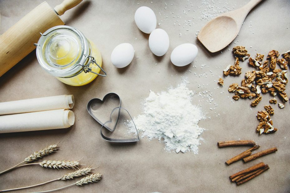Ingredients are set out on a table, mirroring the idea of content coming together from scratch.