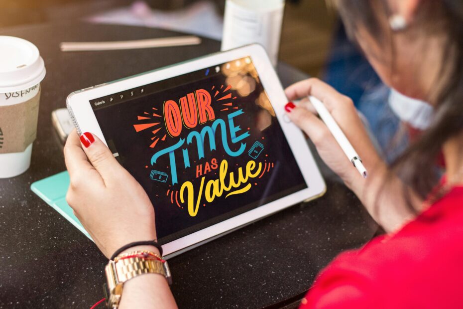 A person holding a tablet that says "Our Time Has Value."